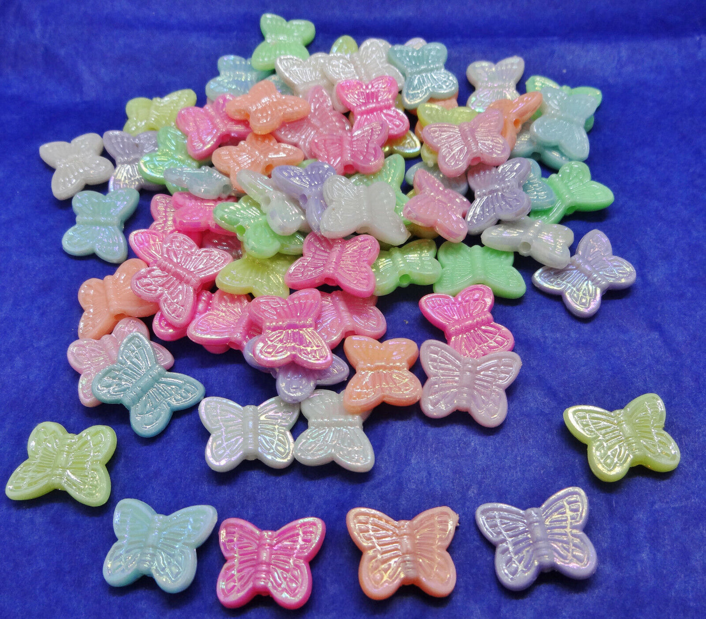 75pcs butterfly beads, 14mm with a pearlised finish