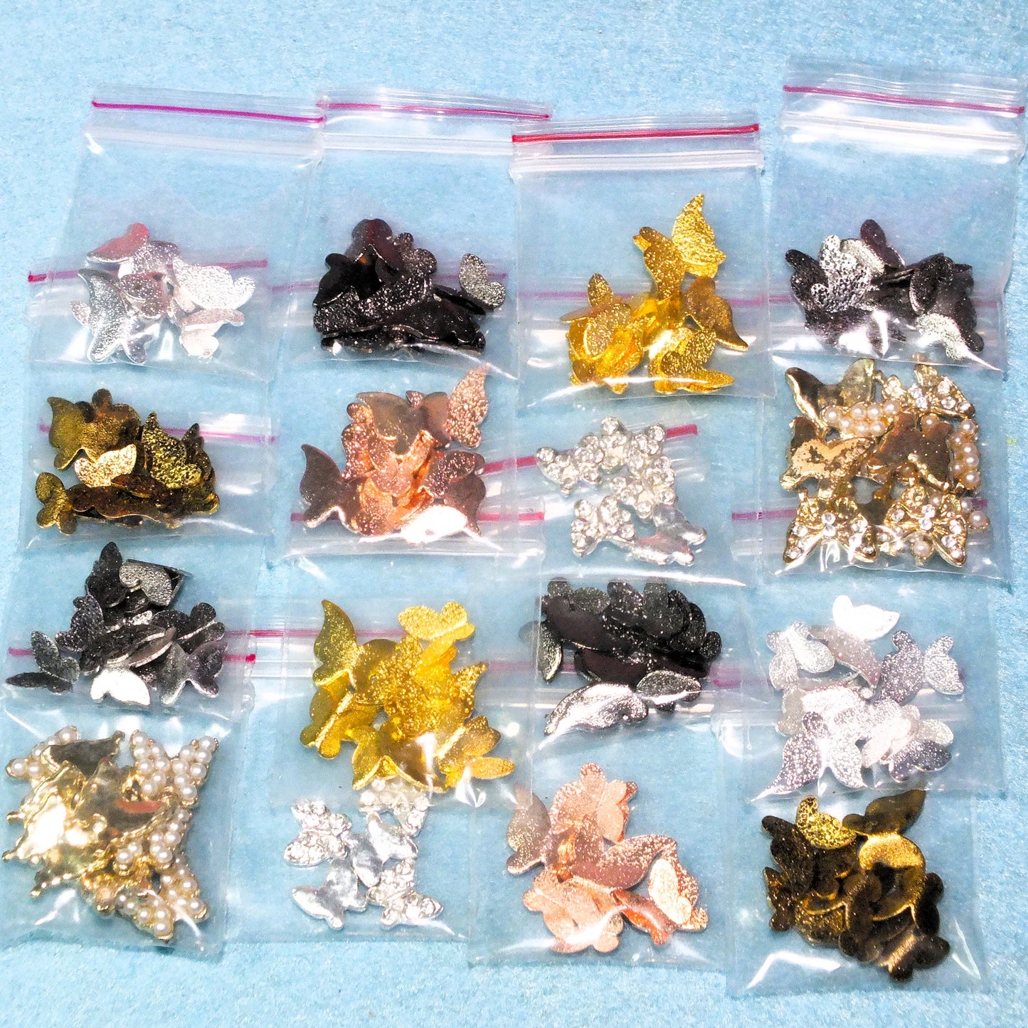 16 packs (150pcs) 3D metal butterfly cabochon charms, different styles & colours