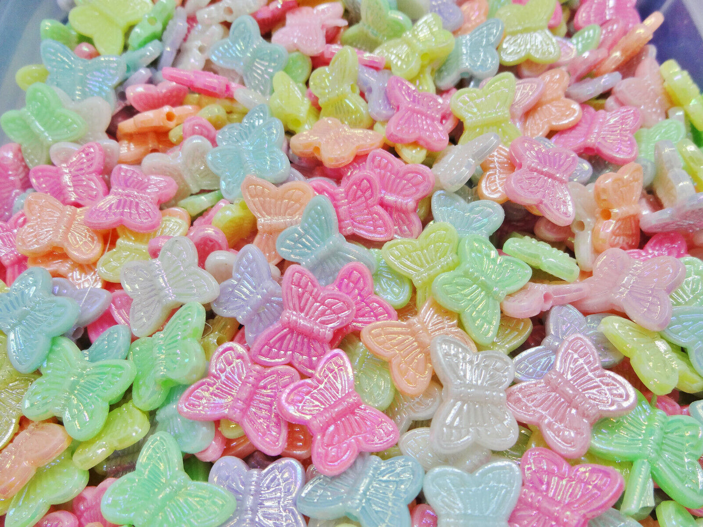 75pcs butterfly beads, 14mm with a pearlised finish
