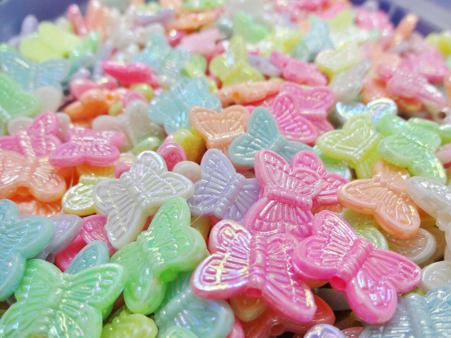 75pcs butterfly beads, 14mm with a pearlised finish