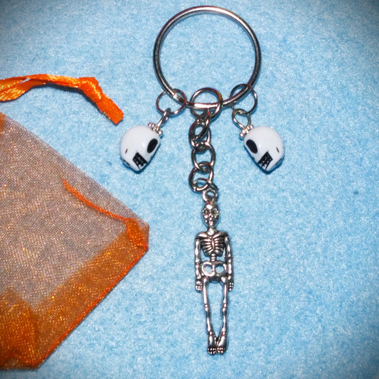 Halloween skeleton keyring with skulls - a spooky gift in organza bag!