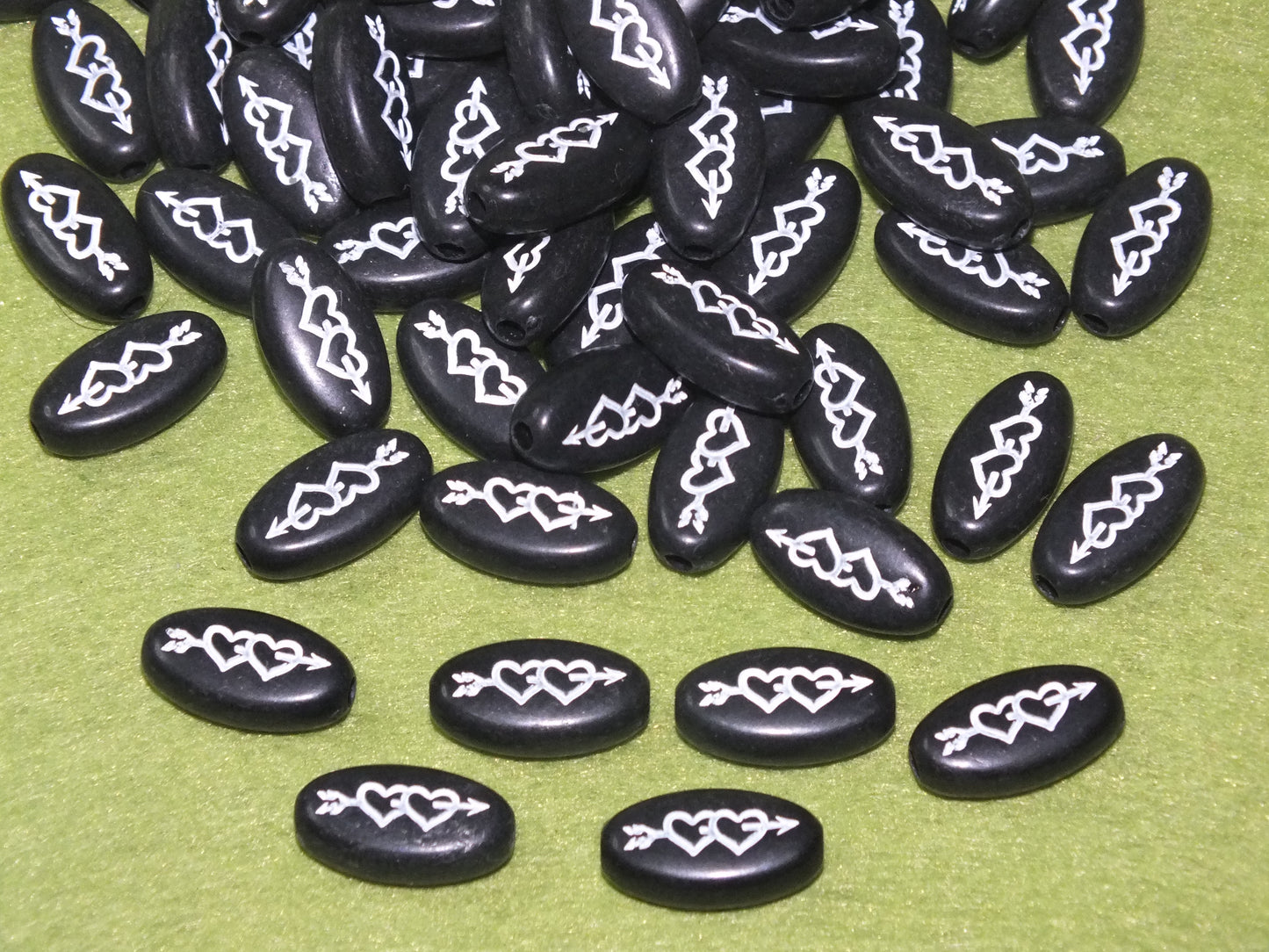 50pcs flat oval two heart & arrow beads, 17.5mm x 10mm black