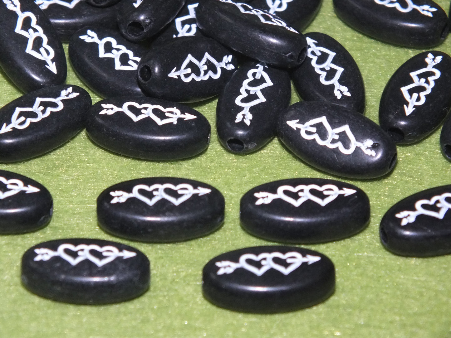 50pcs flat oval two heart & arrow beads, 17.5mm x 10mm black
