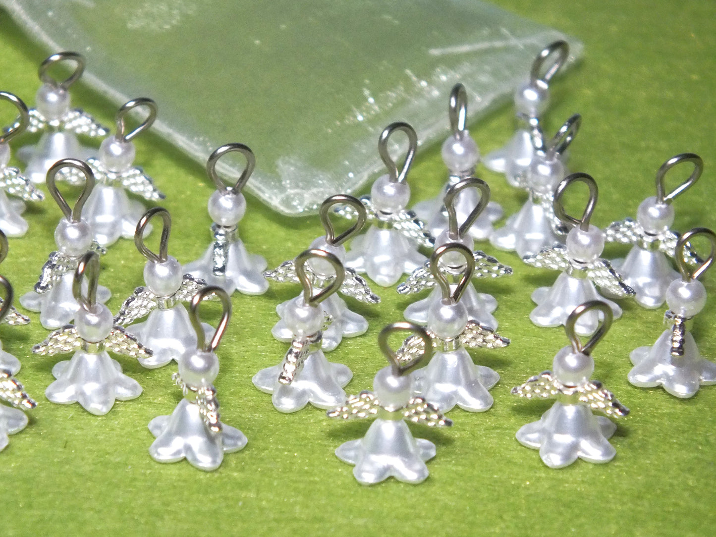 Mini white pearl flower angel charms (12-250pcs, plain, on clasps or lanyards)