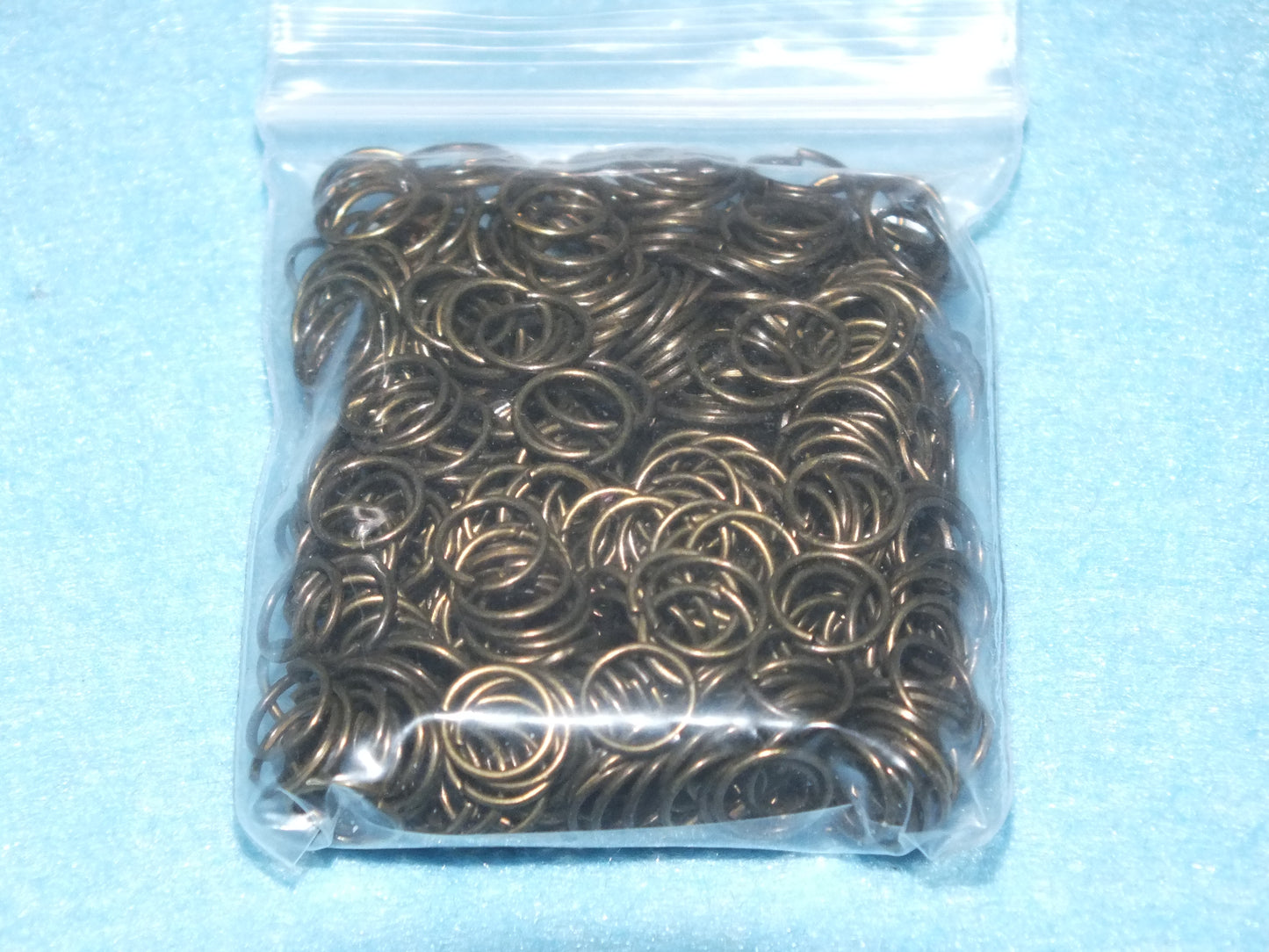 30g / 475pcs bronze tone 7mm jump rings