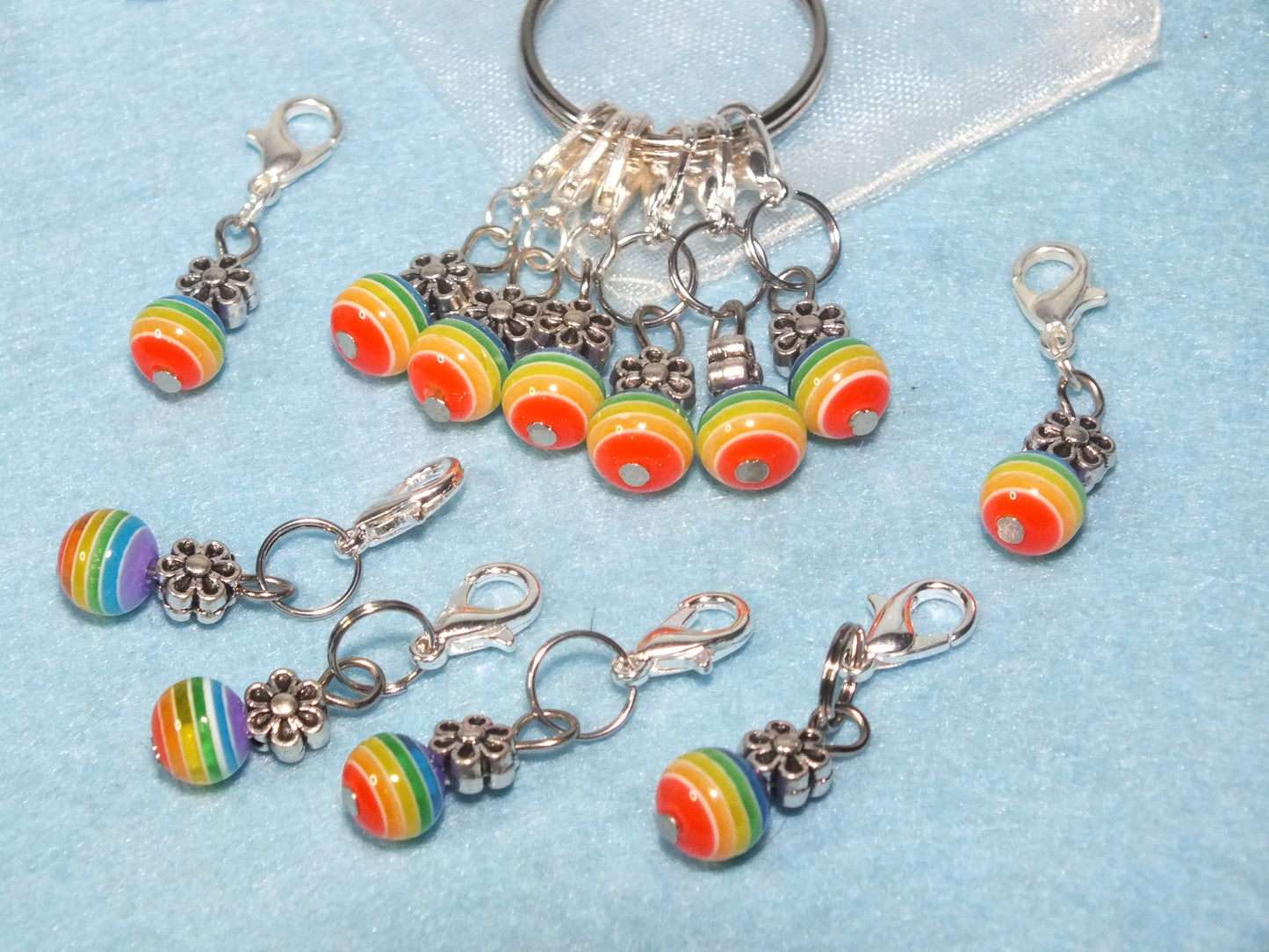 6-12 striped flower stitch markers, on clasps with keyring.