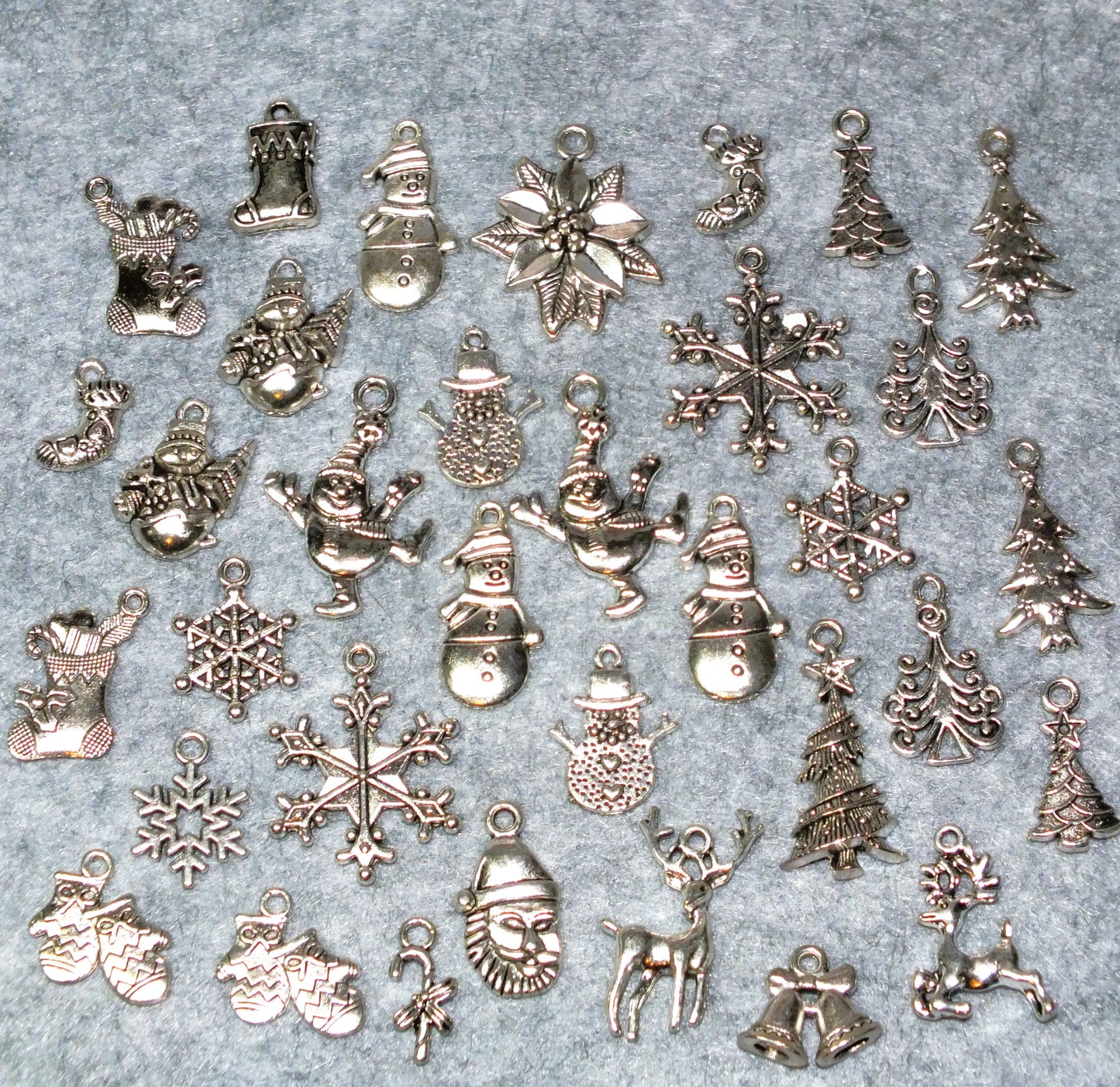 34pcs set Christmas festive charms, silver tone - snowman, tree, snowflake, santa etc.