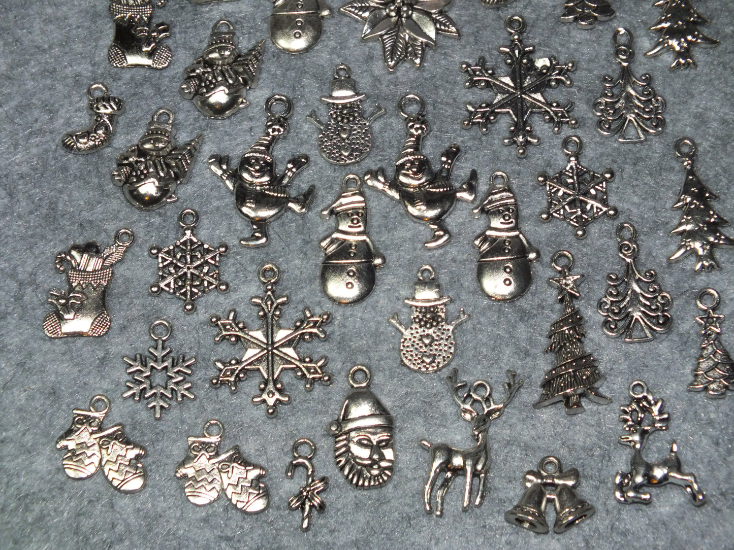 34pcs set Christmas festive charms, silver tone - snowman, tree, snowflake, santa etc.