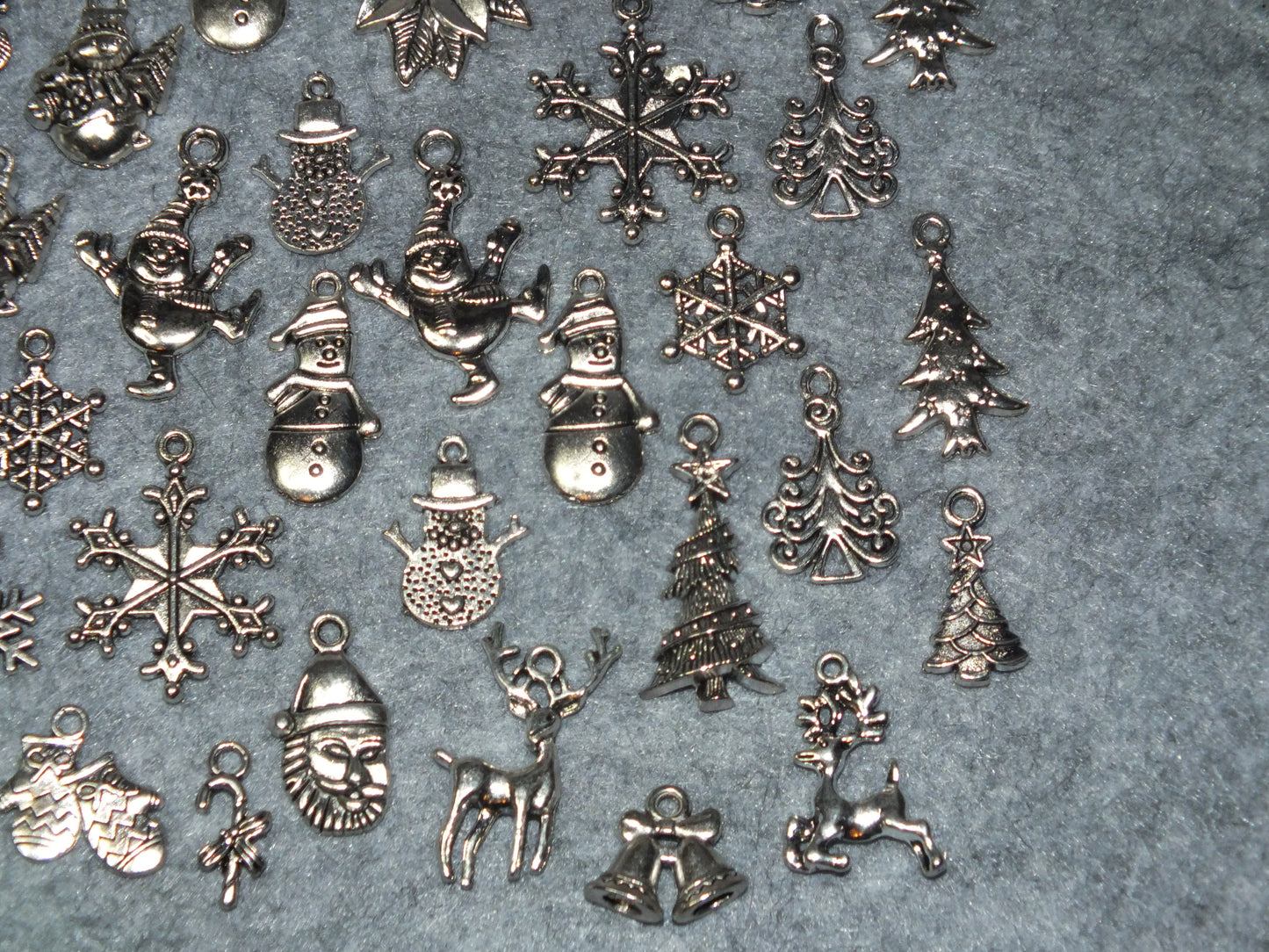 34pcs set Christmas festive charms, silver tone - snowman, tree, snowflake, santa etc.