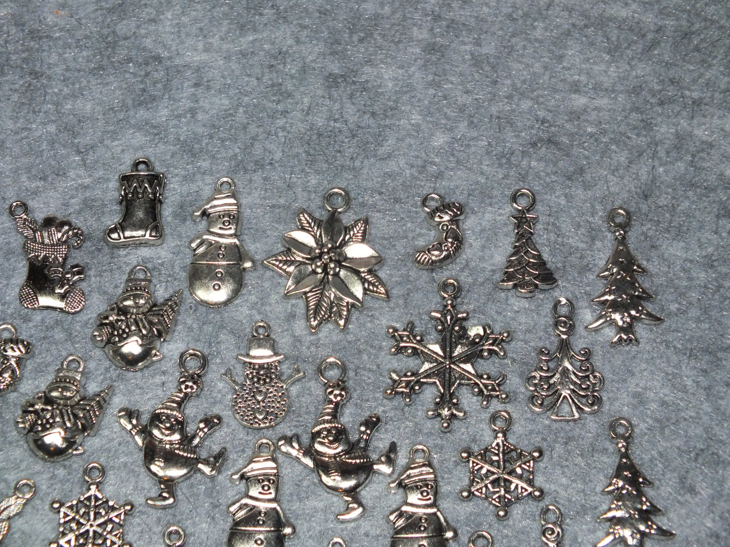 34pcs set Christmas festive charms, silver tone - snowman, tree, snowflake, santa etc.