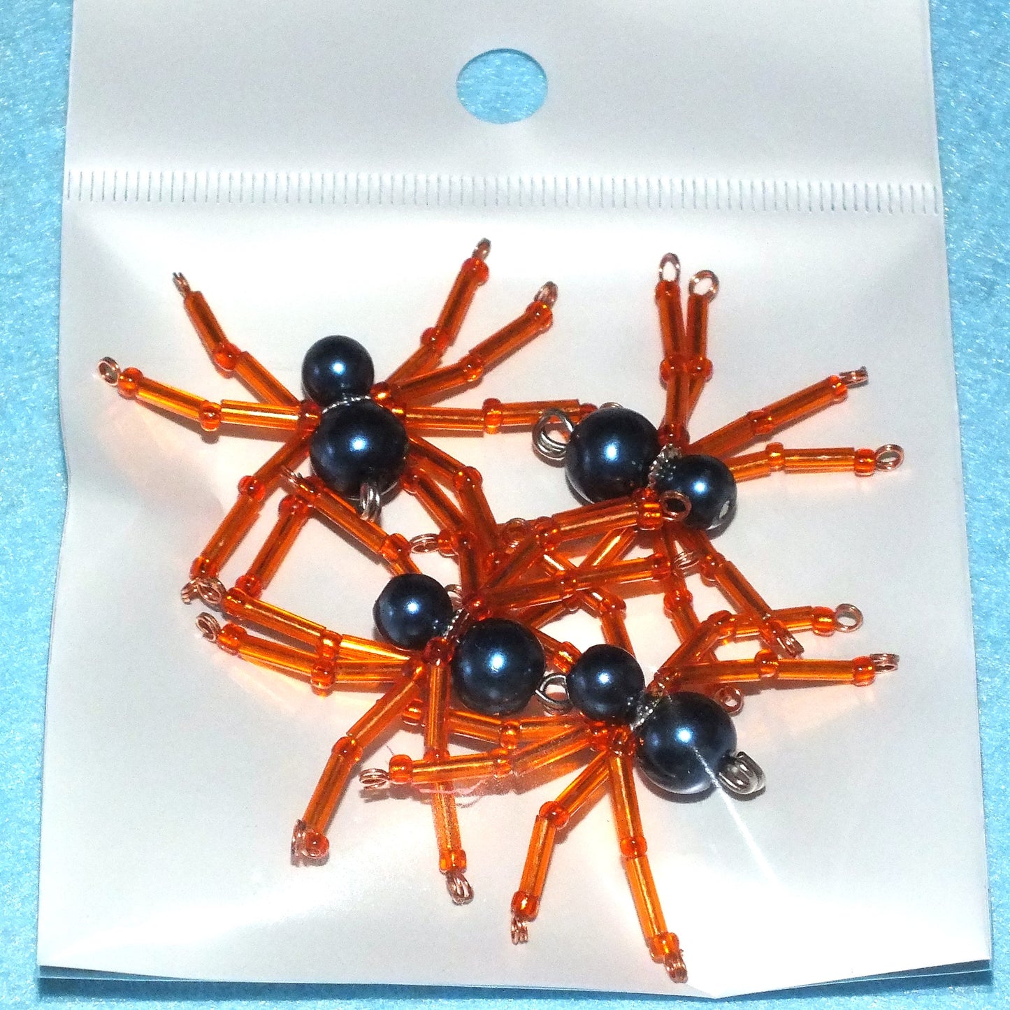 4-pack beaded spider charms - "Jelly-legged Sneaky Chomper", handmade - plain or on lanyards