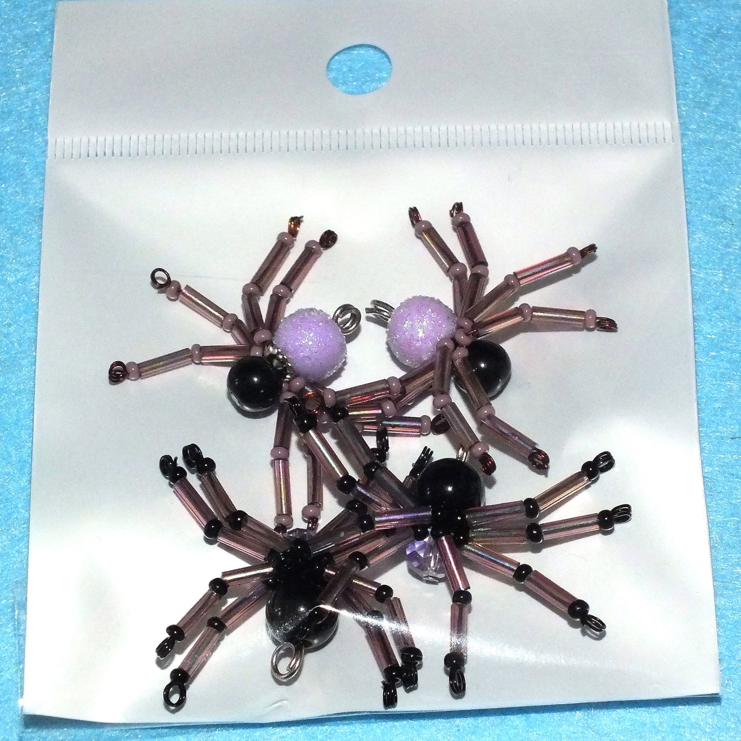 4-pack beaded spider charms - "Purple-black Switcheroos", handmade - plain or on lanyards