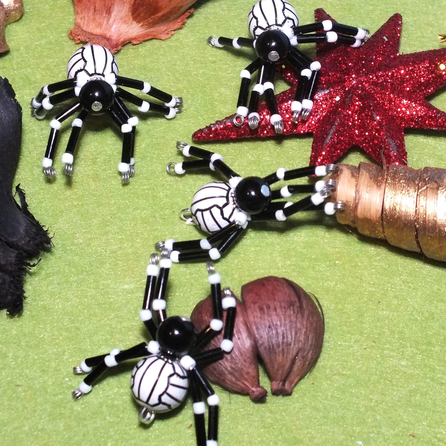 4-pack beaded spider charms - "Crunching Tackler", handmade - plain or on lanyards