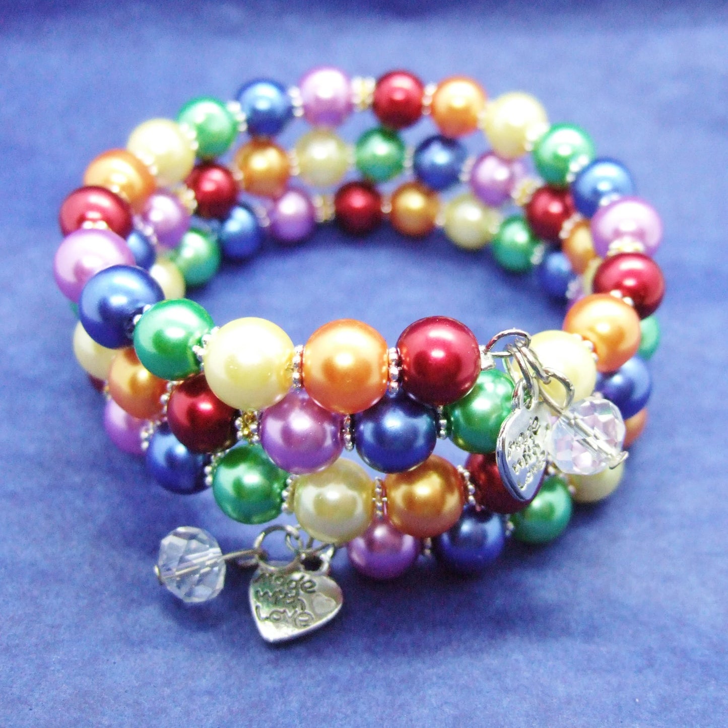 Handmade pride rainbow wraparound pearl bracelet with charms.