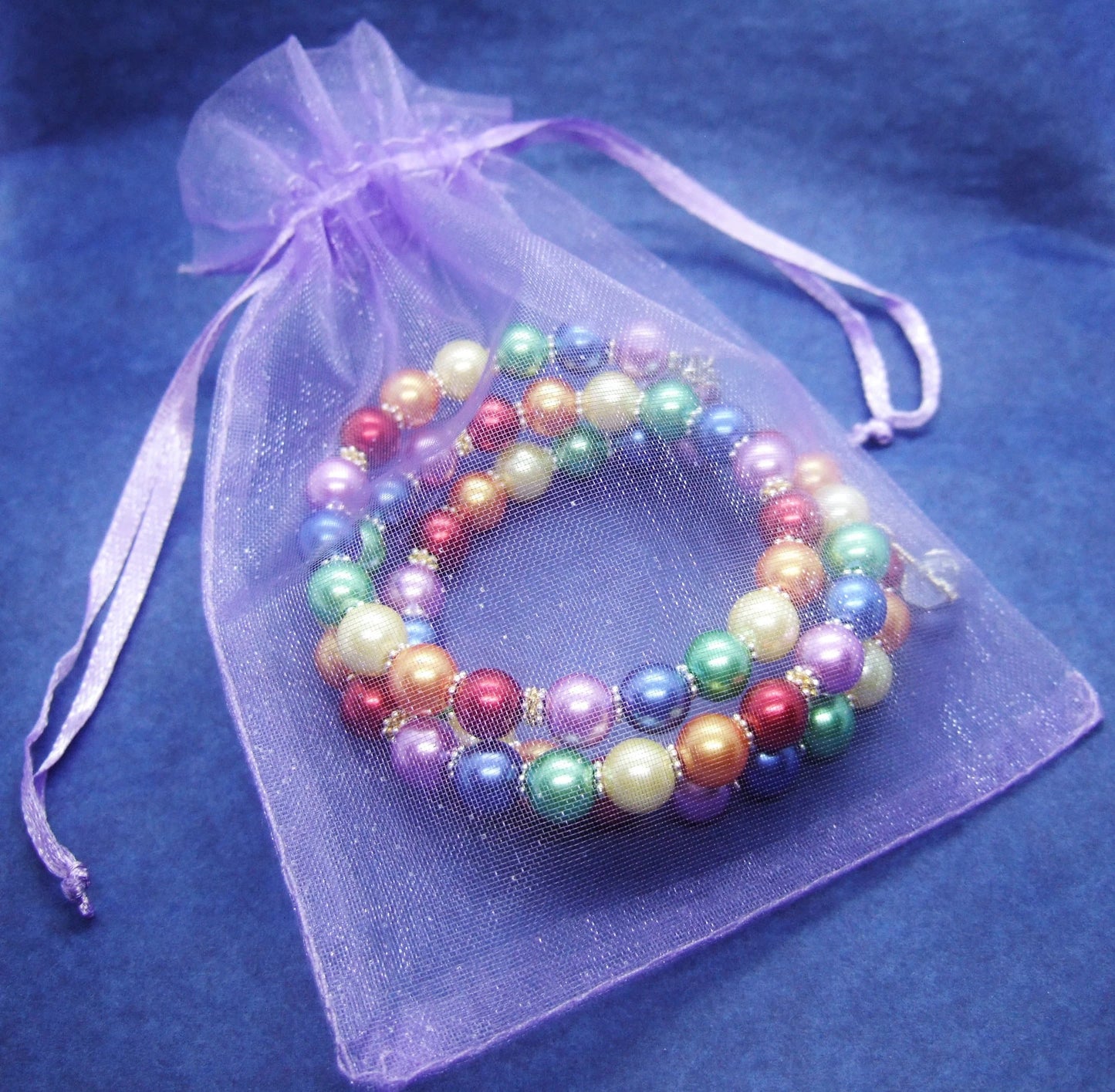 Handmade pride rainbow wraparound pearl bracelet with charms.
