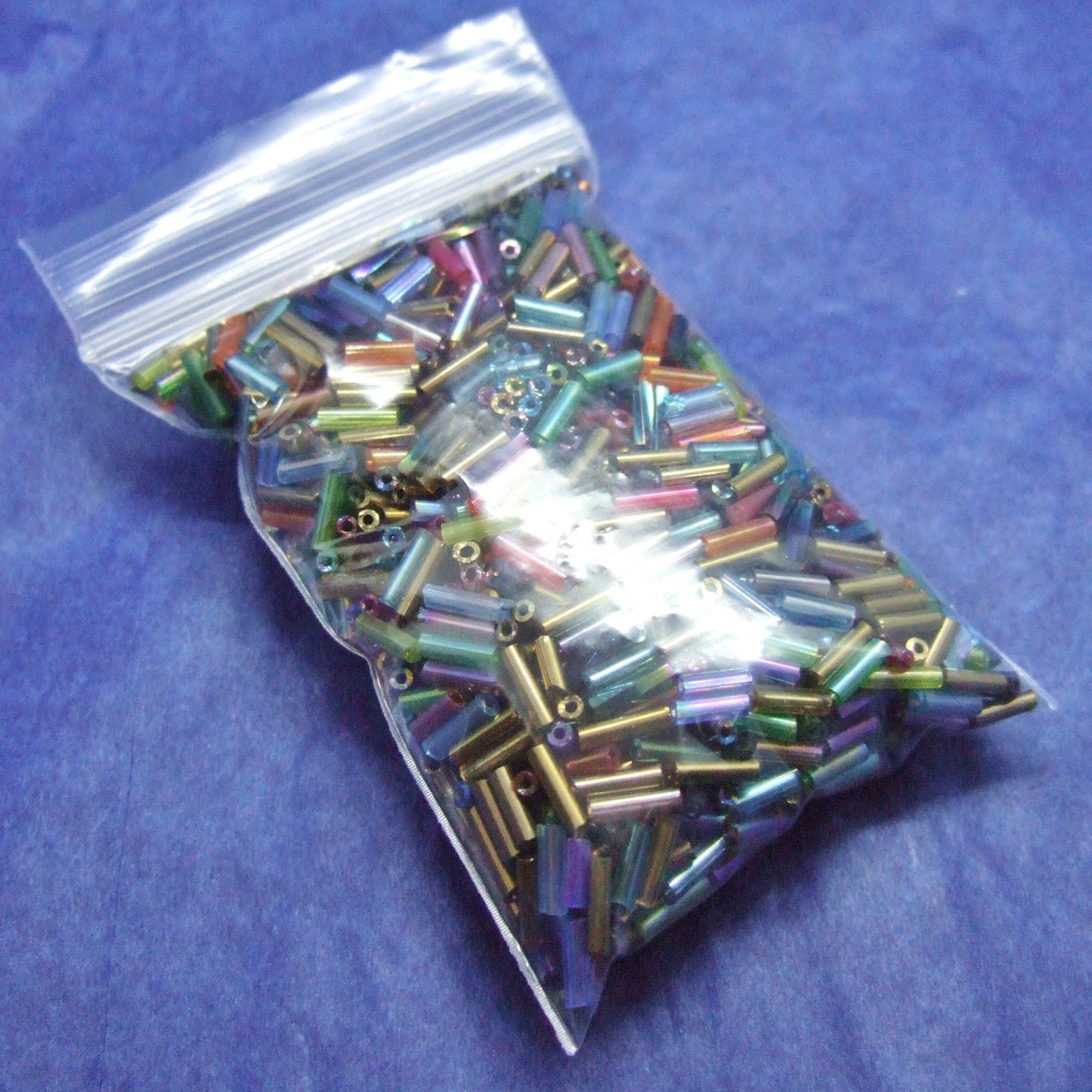 Iridescent mix 6-8mm glass bugle beads, 50g