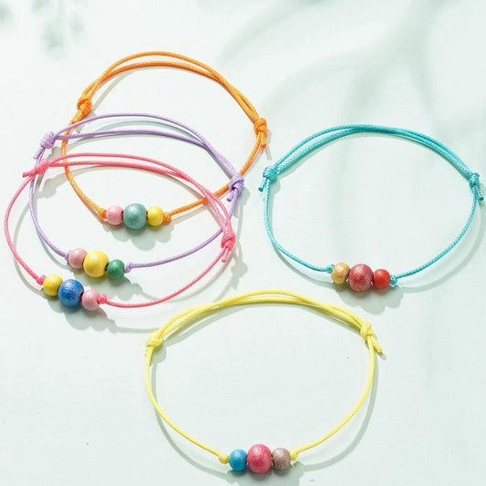 5 - 50 adjustable cord friendship bracelets with wooden beads, random mixed colours