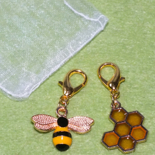 2pcs bee & honeycomb enamel, metal & resin dangle charms. A pretty pair!