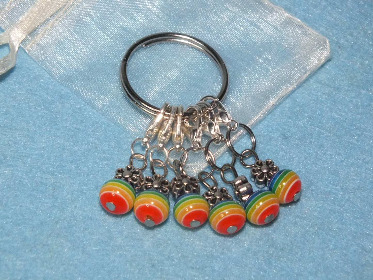 6-12 striped flower stitch markers, on clasps with keyring.