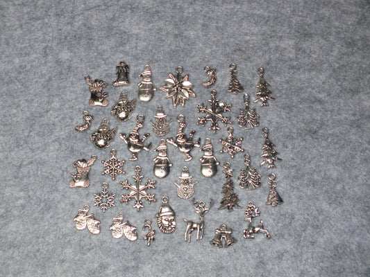 34pcs set Christmas festive charms, silver tone - snowman, tree, snowflake, santa etc.