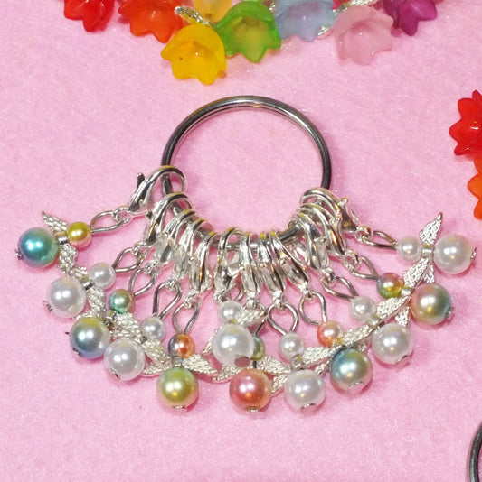 12 mixed white/rainbow angel stitch markers, handmade, on clasps with keyring.