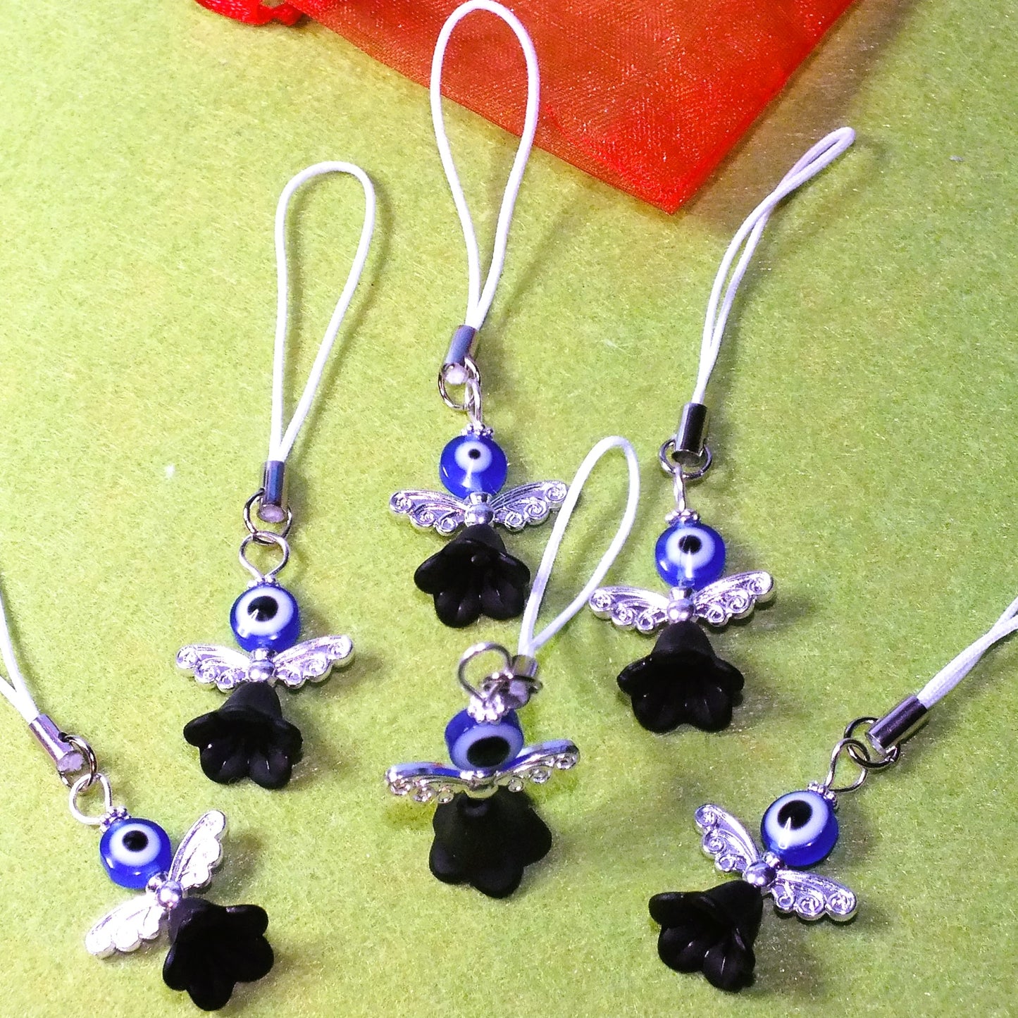 6 blue Halloween Evil Eye angel charms on lanyards