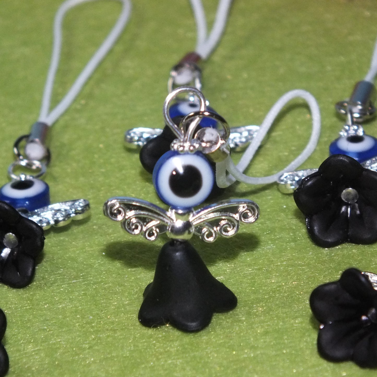 6 blue Halloween Evil Eye angel charms on lanyards
