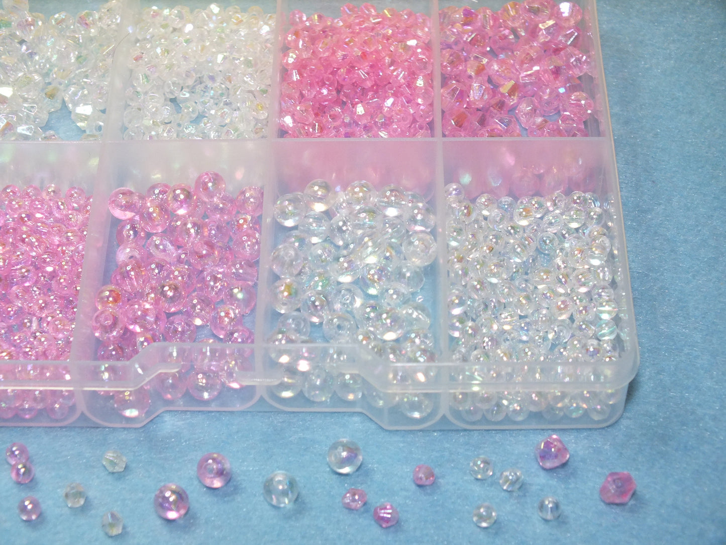 1,000pcs pink / white round & bicone beads, 4mm and 6mm of each.