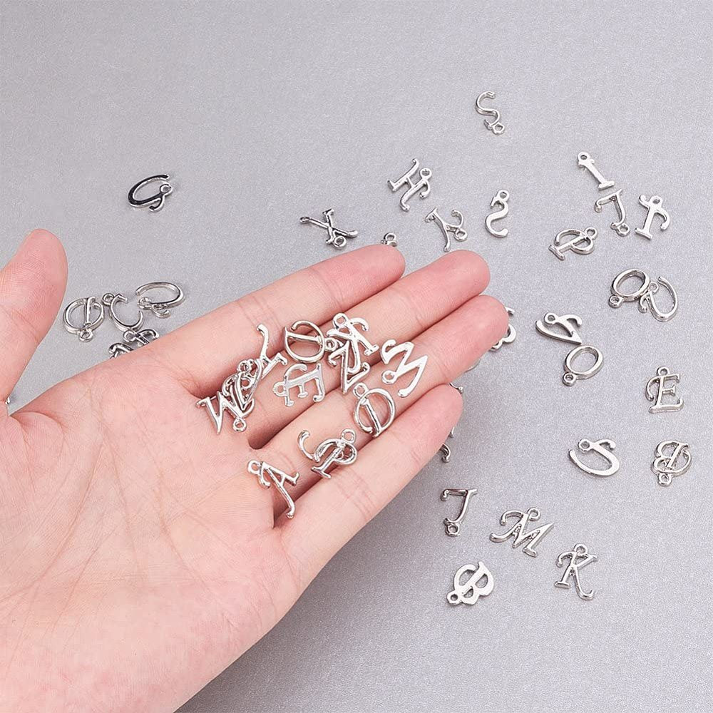 A-Z set of silver tone rack plated alphabet letter charms, 12mm - 17mm