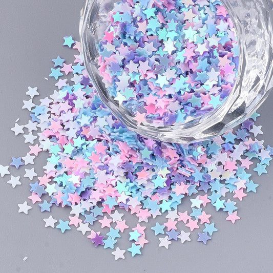 10g pack of tiny 2.5mm star sequins, pastel pink / blue mix with an AB finish (5,000pcs)