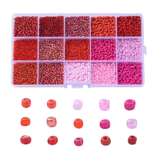 180g box of red / pink 3mm seed beads, 15 shades - pearlised, frosted, opaque, translucent, silver lined finishes.