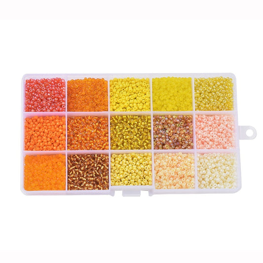 180g box of yellow / orange 3mm seed beads, 15 shades - pearlised, frosted, opaque, translucent, silver lined finishes.