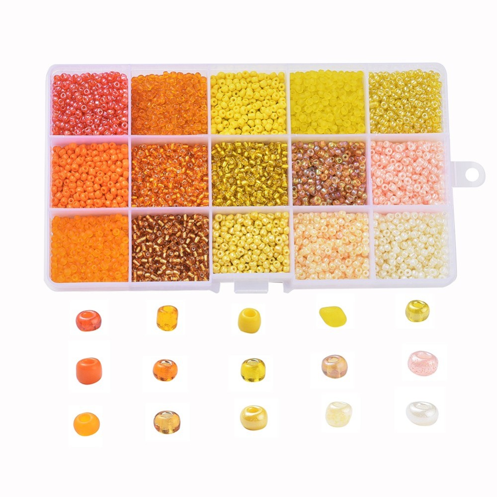 180g box of yellow / orange 3mm seed beads, 15 shades - pearlised, frosted, opaque, translucent, silver lined finishes.