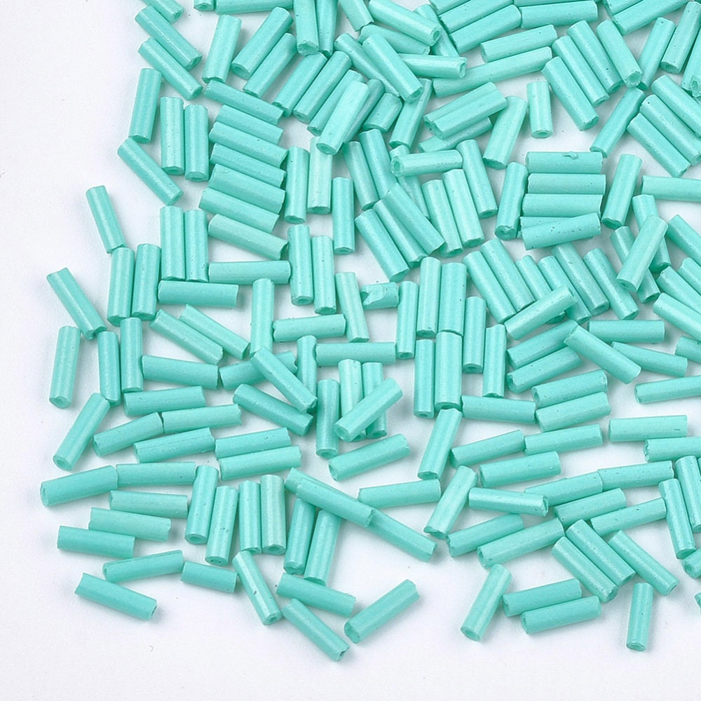 Turquoise blue 6-7mm glass bugle beads, 50g