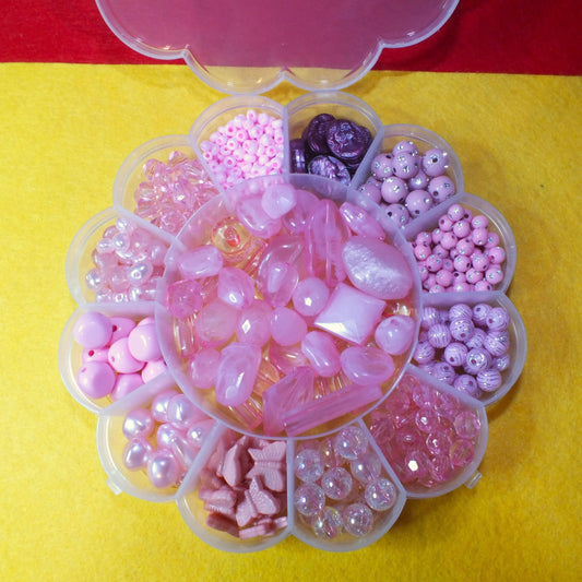 Pink beading kit, mixed beads in a flower box.