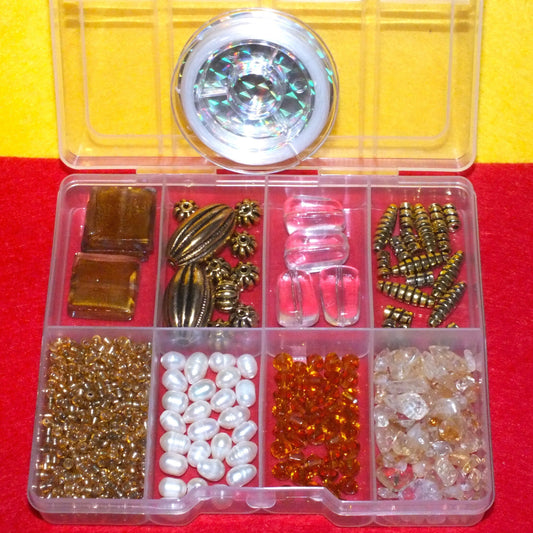 'Desert' mix craft bead box plus reel of elastic - gold, brown, clear, white, orange beads plus seeds